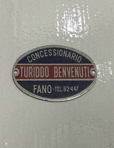 Turiddo Benedetti dealer plate