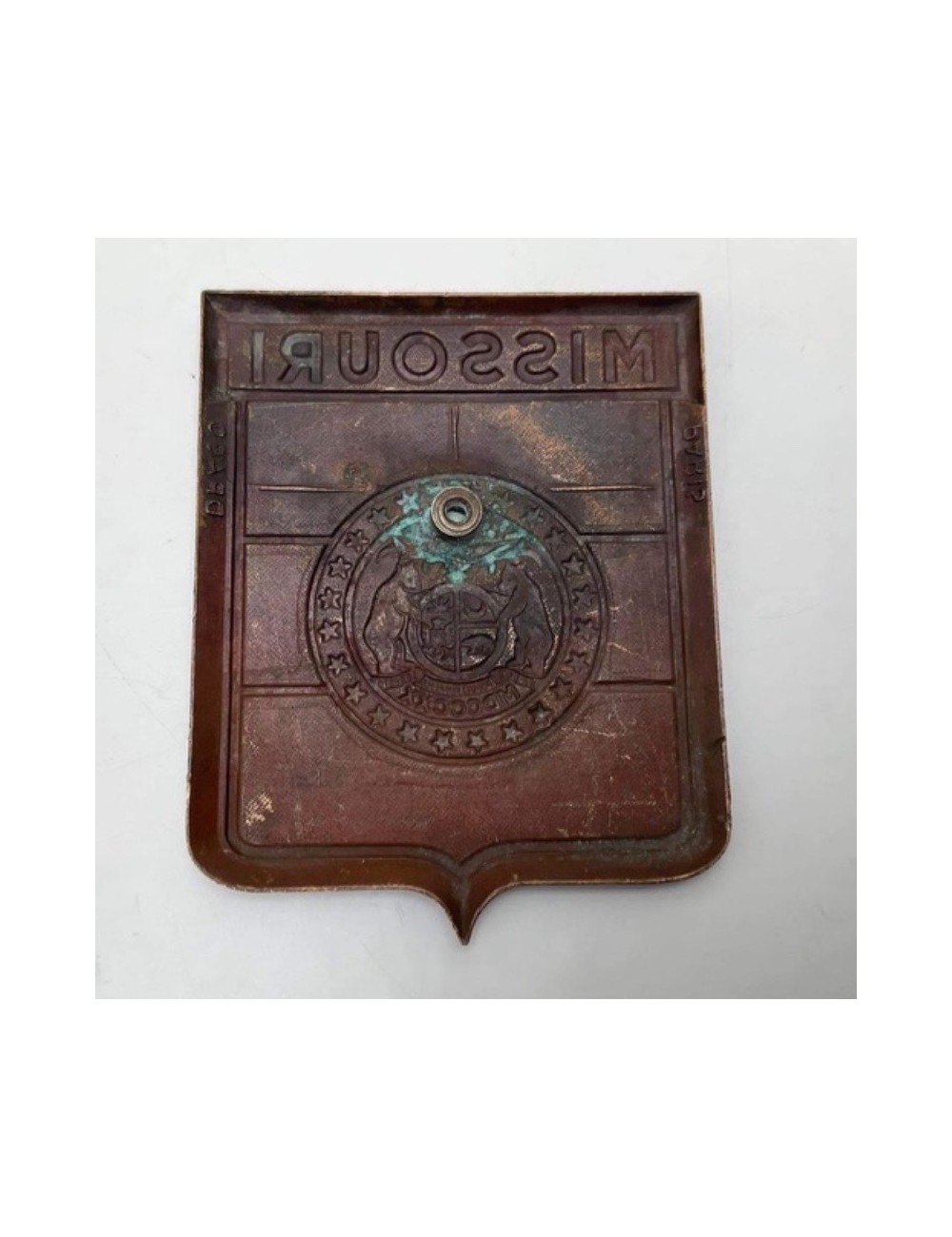 Placca Drago Missouri. Dimensioni : 7 cm x 6 cm