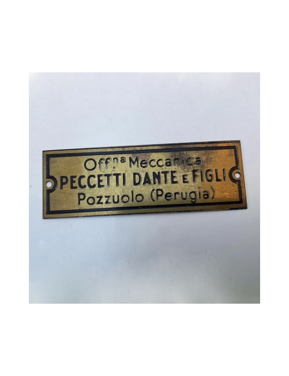 Targhetta concessionario Peccetti Dante e Figli. Dimensioni:  6 cm x 2 cm