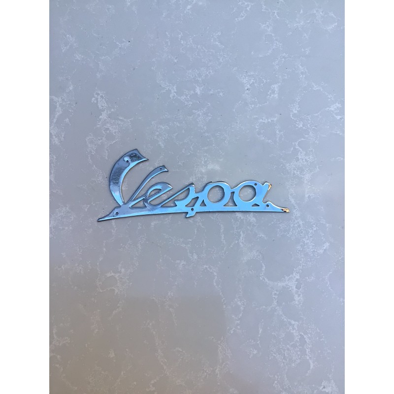 Targhetta Vespa Faro Basso cromata