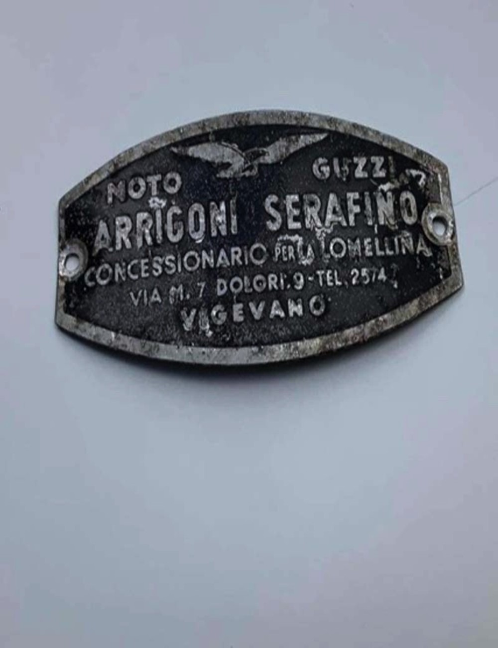 Targhetta concessionario Arrigoni Serafino. 6 cm