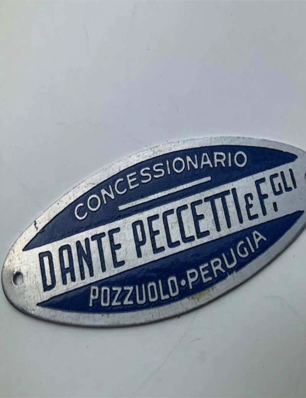 Targhetta concessionario Dante Peccetti. 5 cm