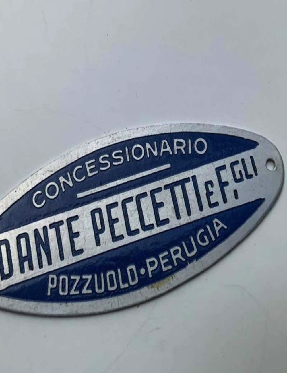 Targhetta concessionario Dante Peccetti. 5 cm
